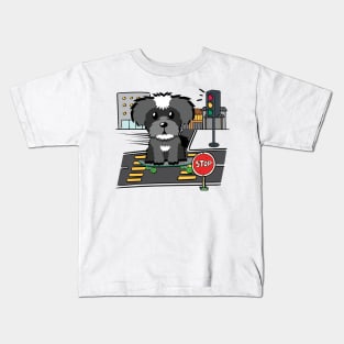 Funny schnauzer is on a skateboard Kids T-Shirt